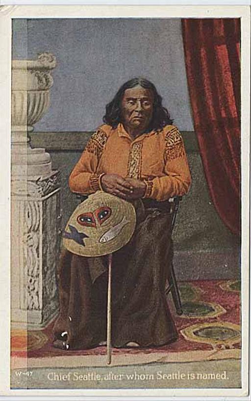 A colored postcard often replicated from an original photo of Chief Seattle, the leader of the Duwamish and Suquamish people. He is seated holding a traditional cedar bark hat.